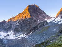 Gestartet bin ich um 6 Uhr von der Etzlihütte aus. Bereits geht die Sonne auf am Piz Nair. : Etzlihütte Praktikum Hüttenwartskurs